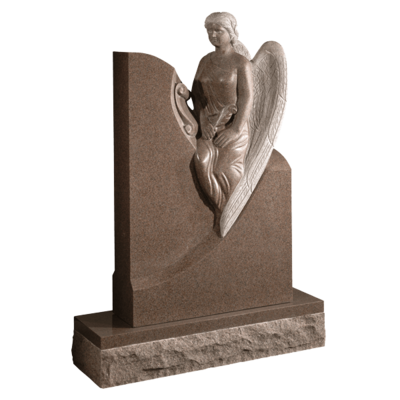 Carved Angel Sitting On Headstone