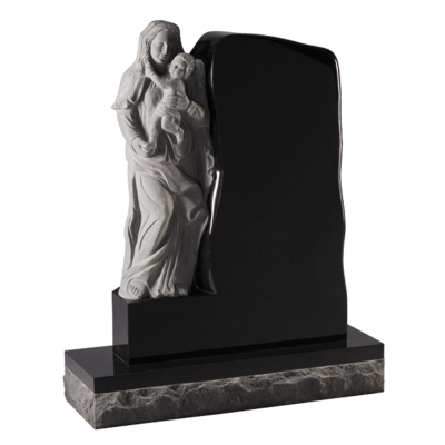 Carved Angel Sitting On Headstone