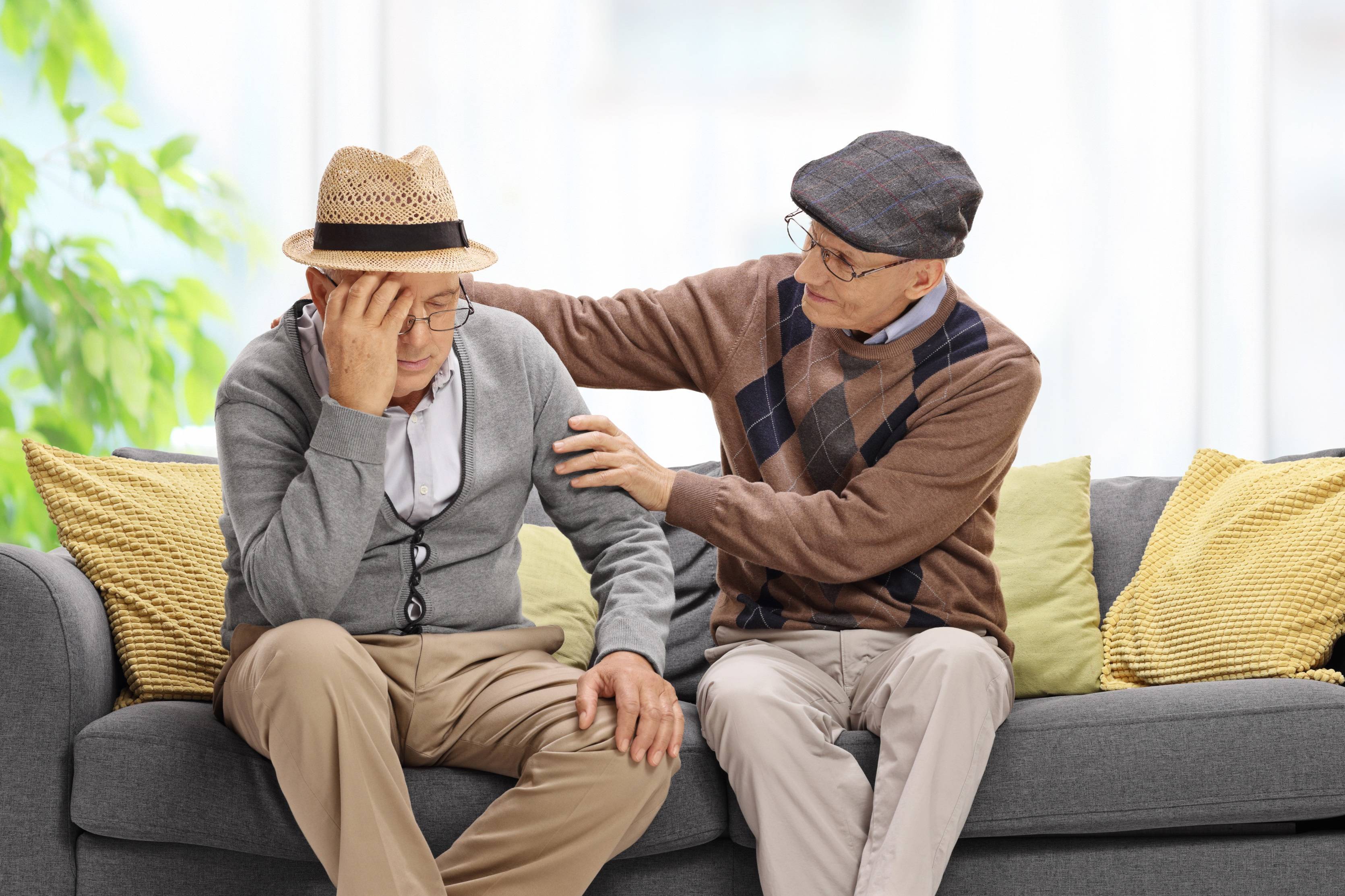 Two men sharing condolences