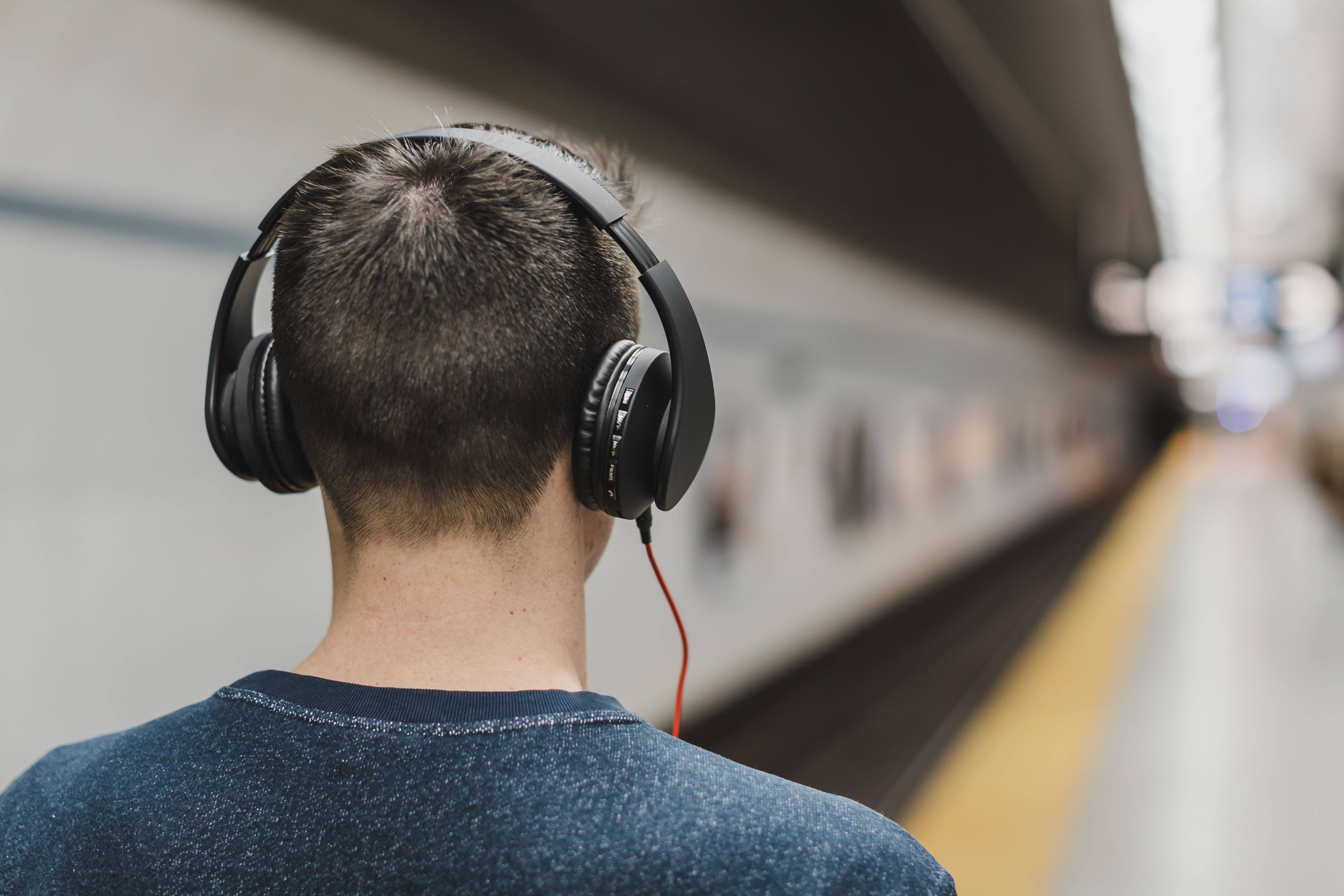 man walking with headphones