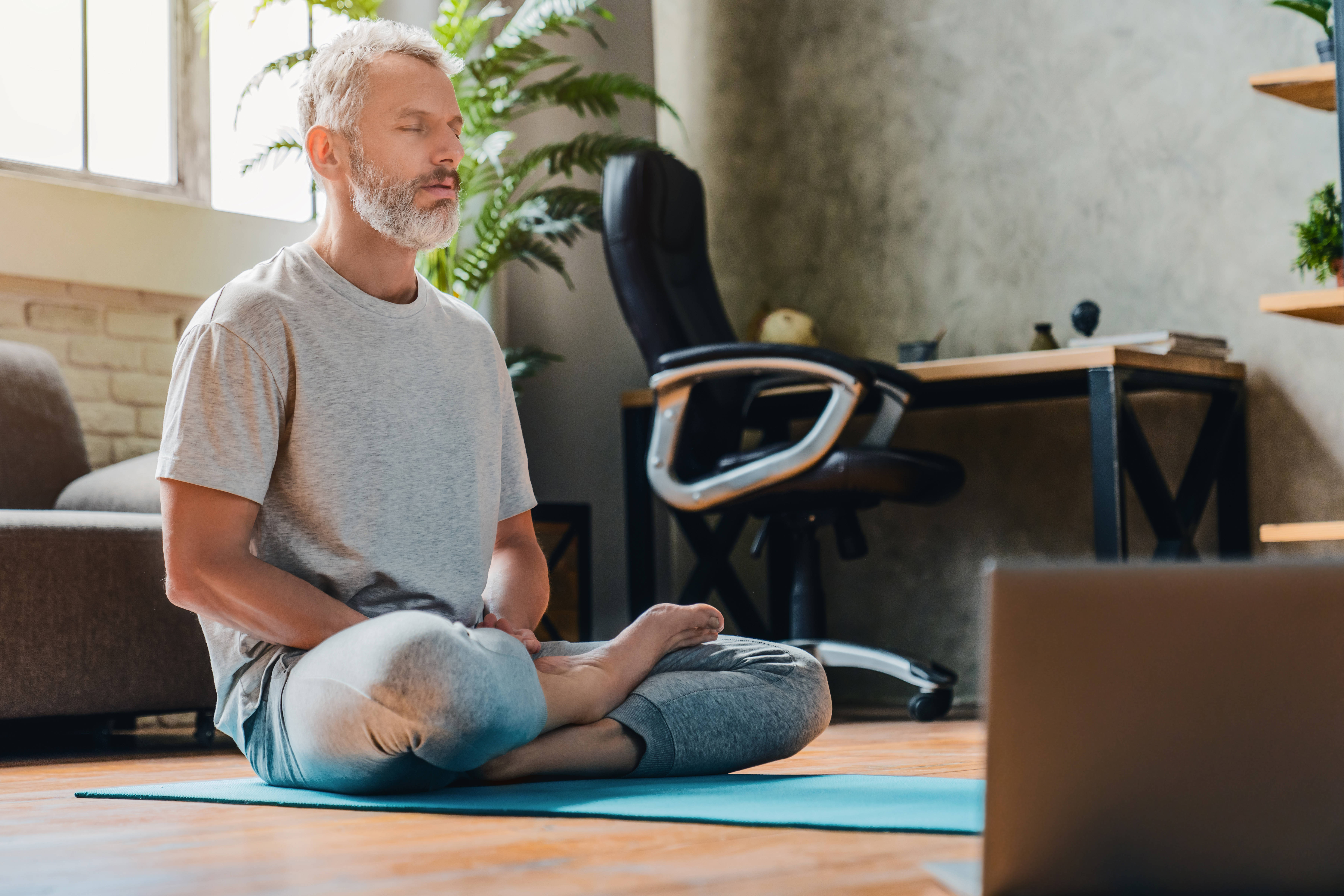 Middle Aged Man Practising Mindfulness