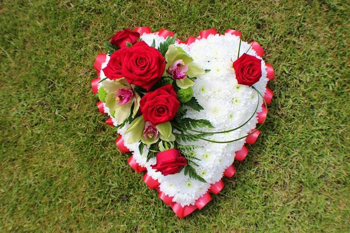 Heart-shaped floral funeral display
