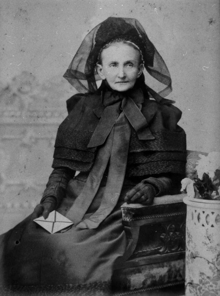 Woman in full mourning attire