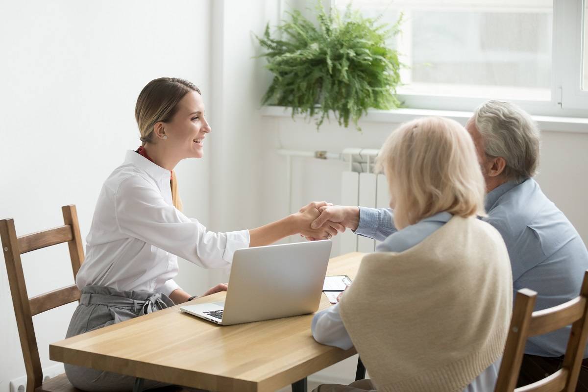 Elderly couple meeting lawyer