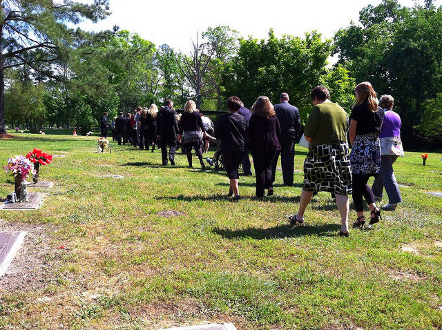 /www.aklander.co.uk/image/catalog/people walking at funeral