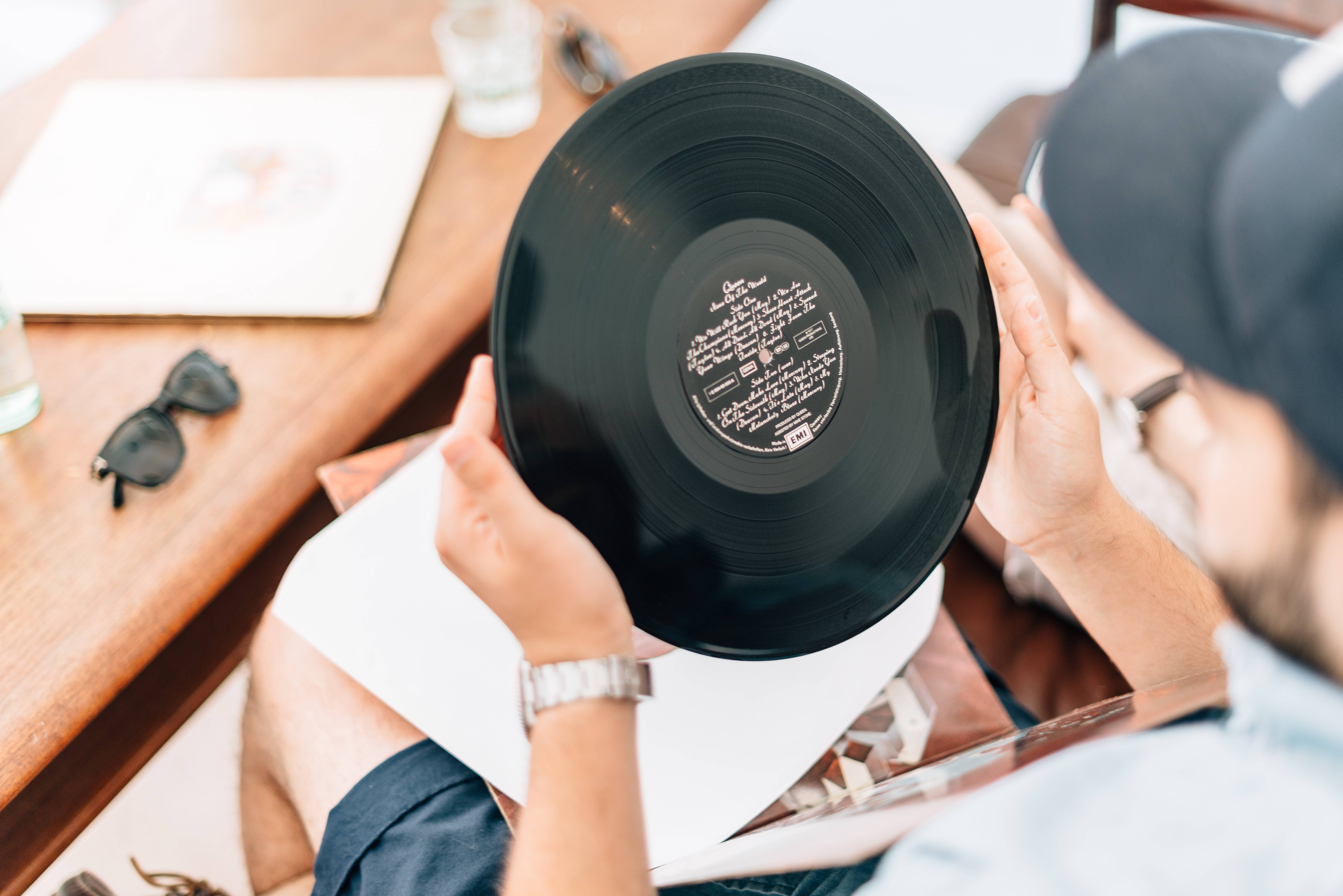 Man holding vinyl record