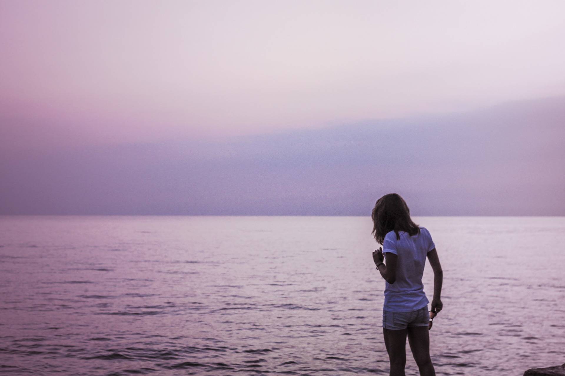 A woman looking out at the ocean