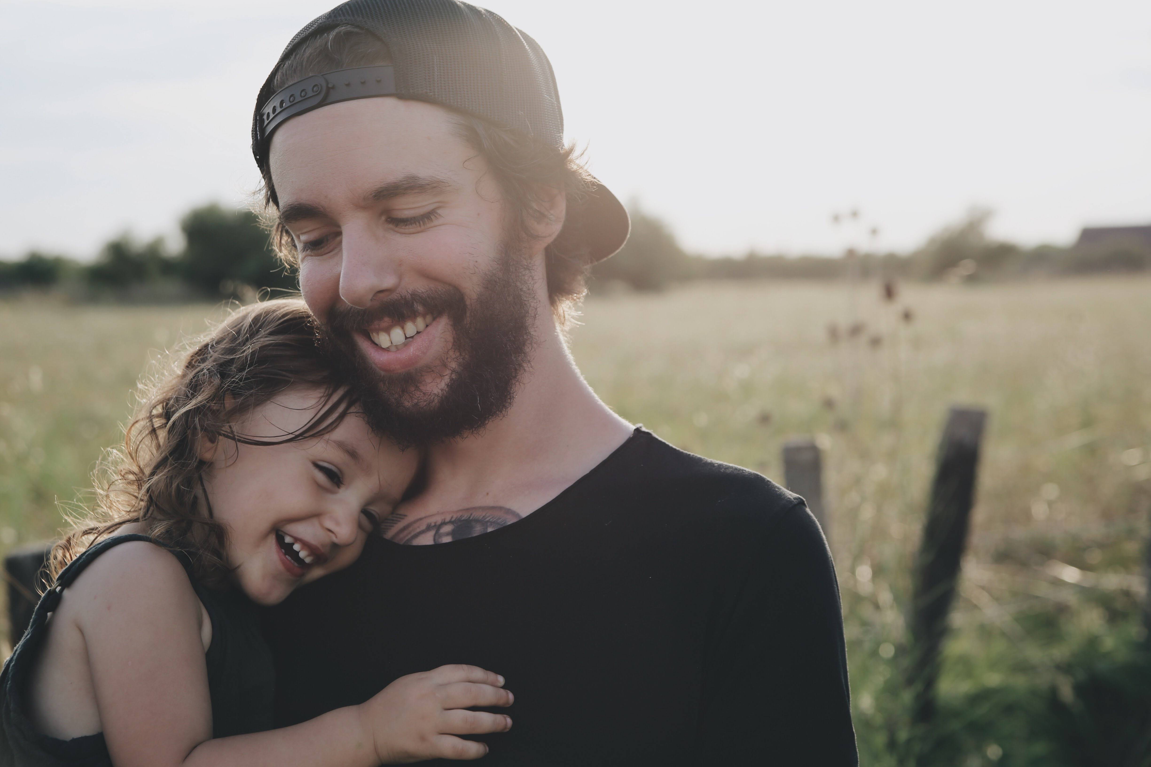 dad and daughter hugging