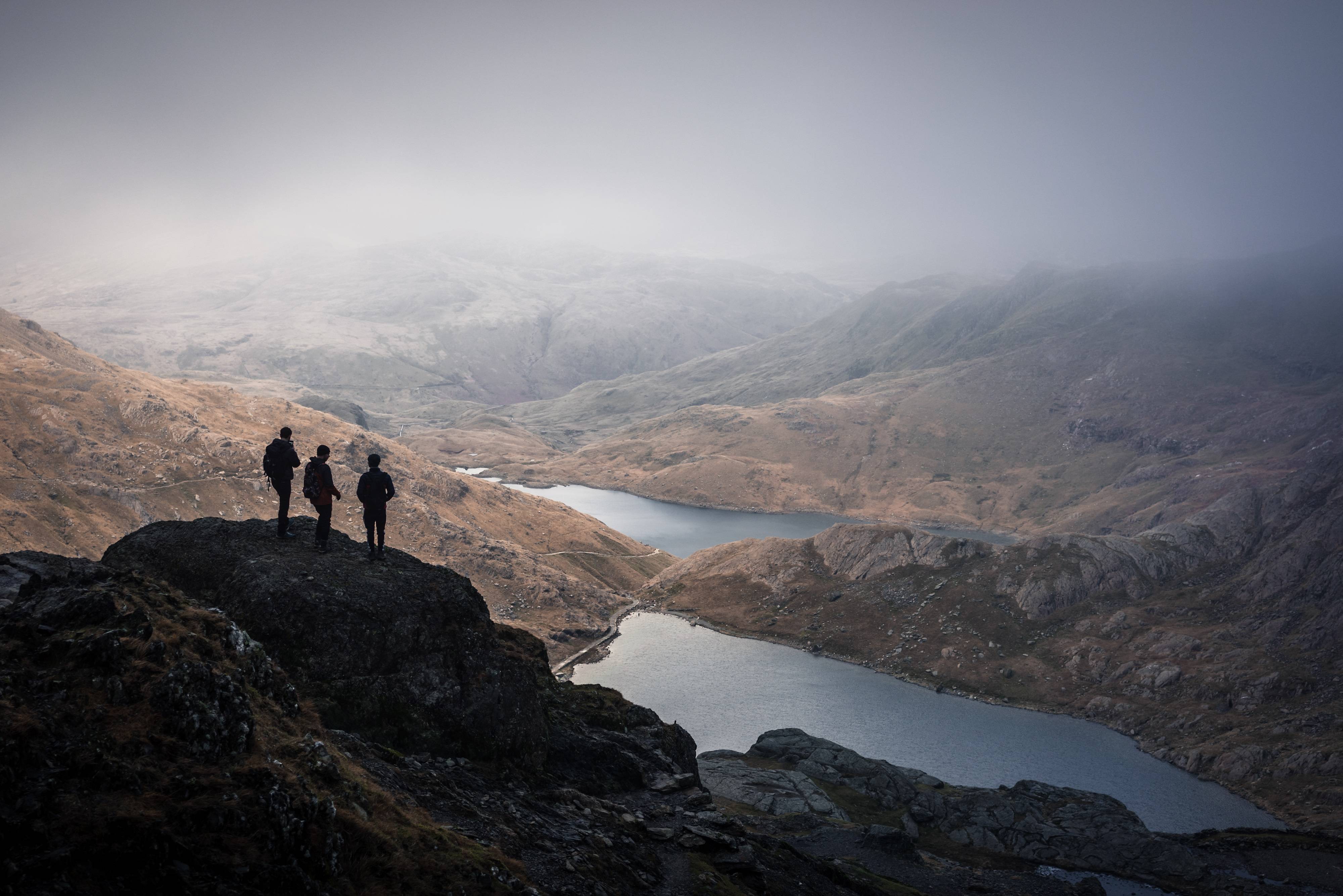 Family scattering ashes at Snowdon
