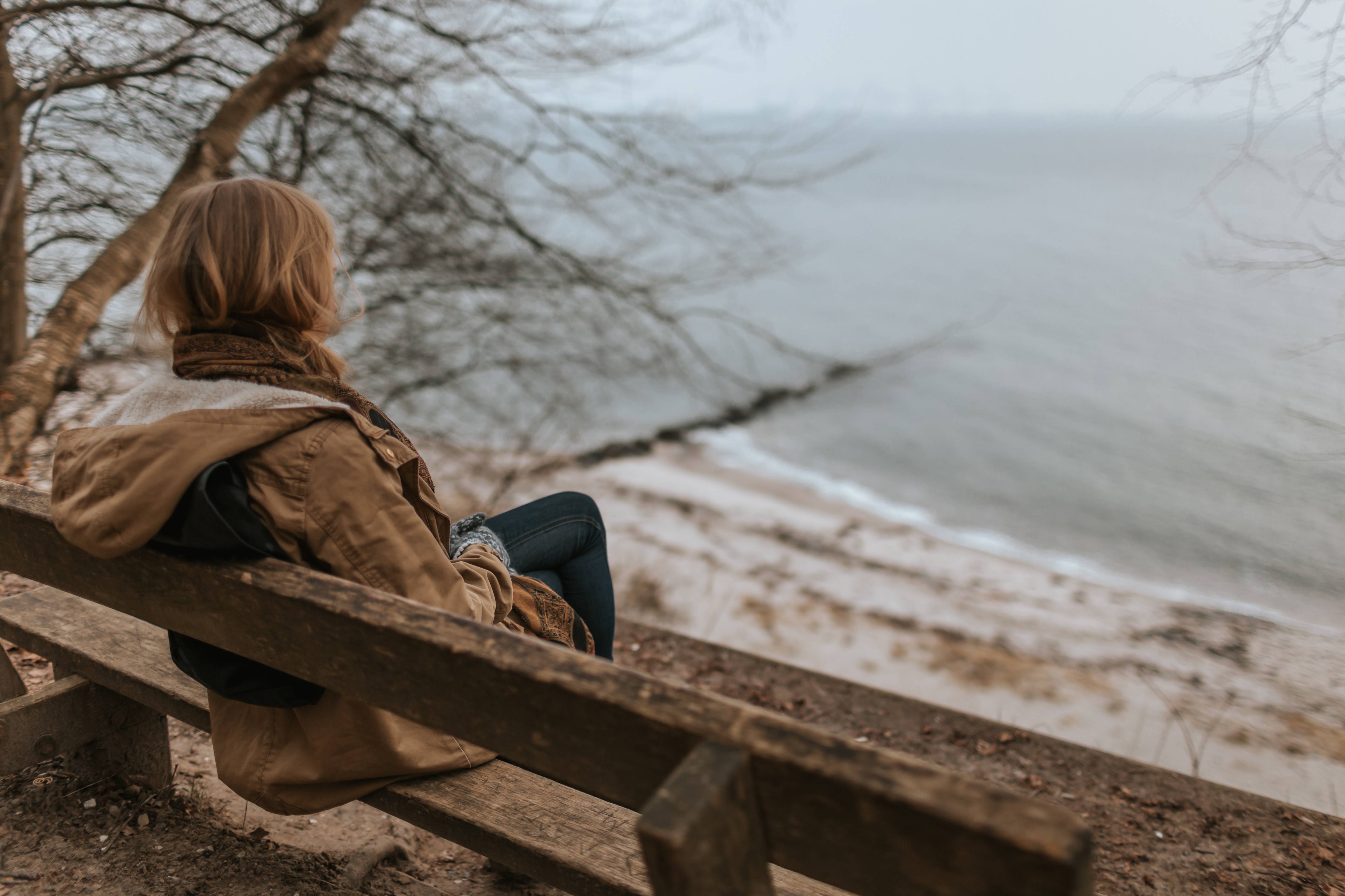 Woman sat on a bench