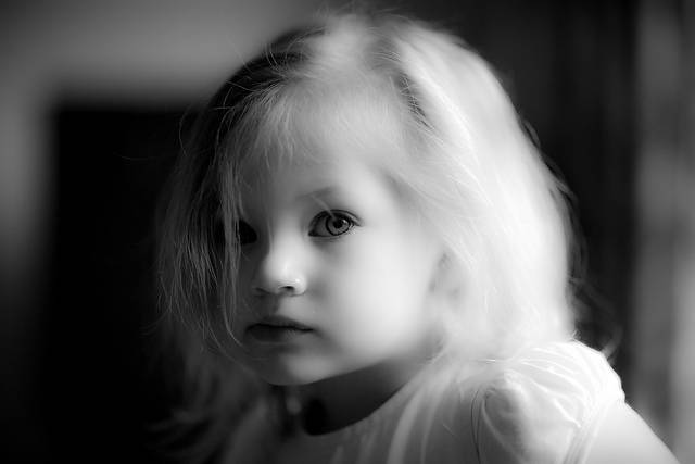 Black and white photo of little girl