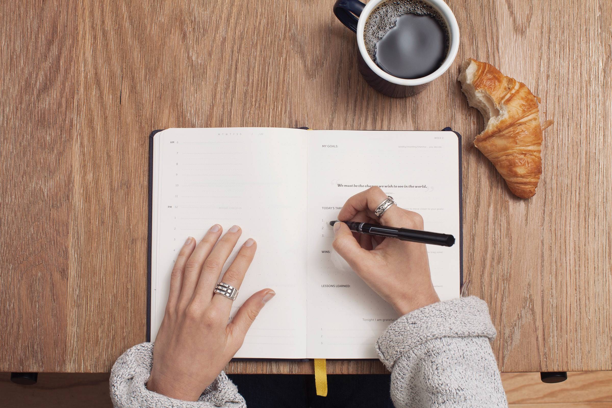 Woman writing in a journal