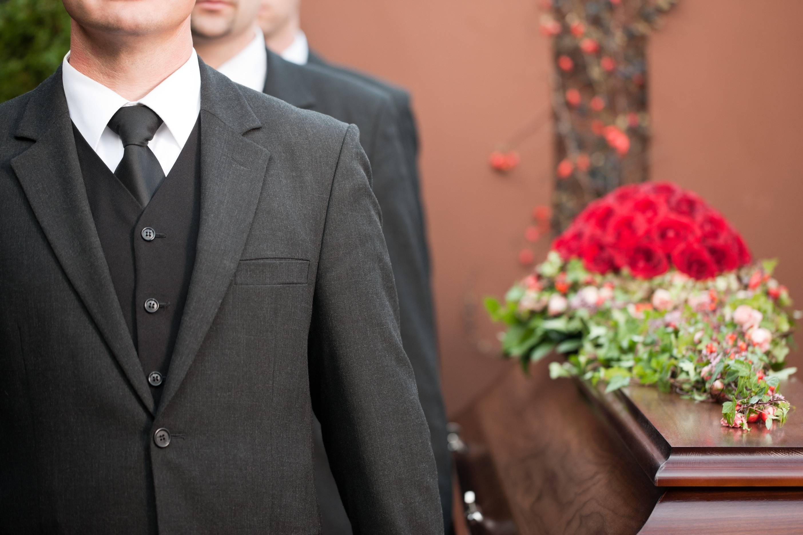 Man carrying a coffin