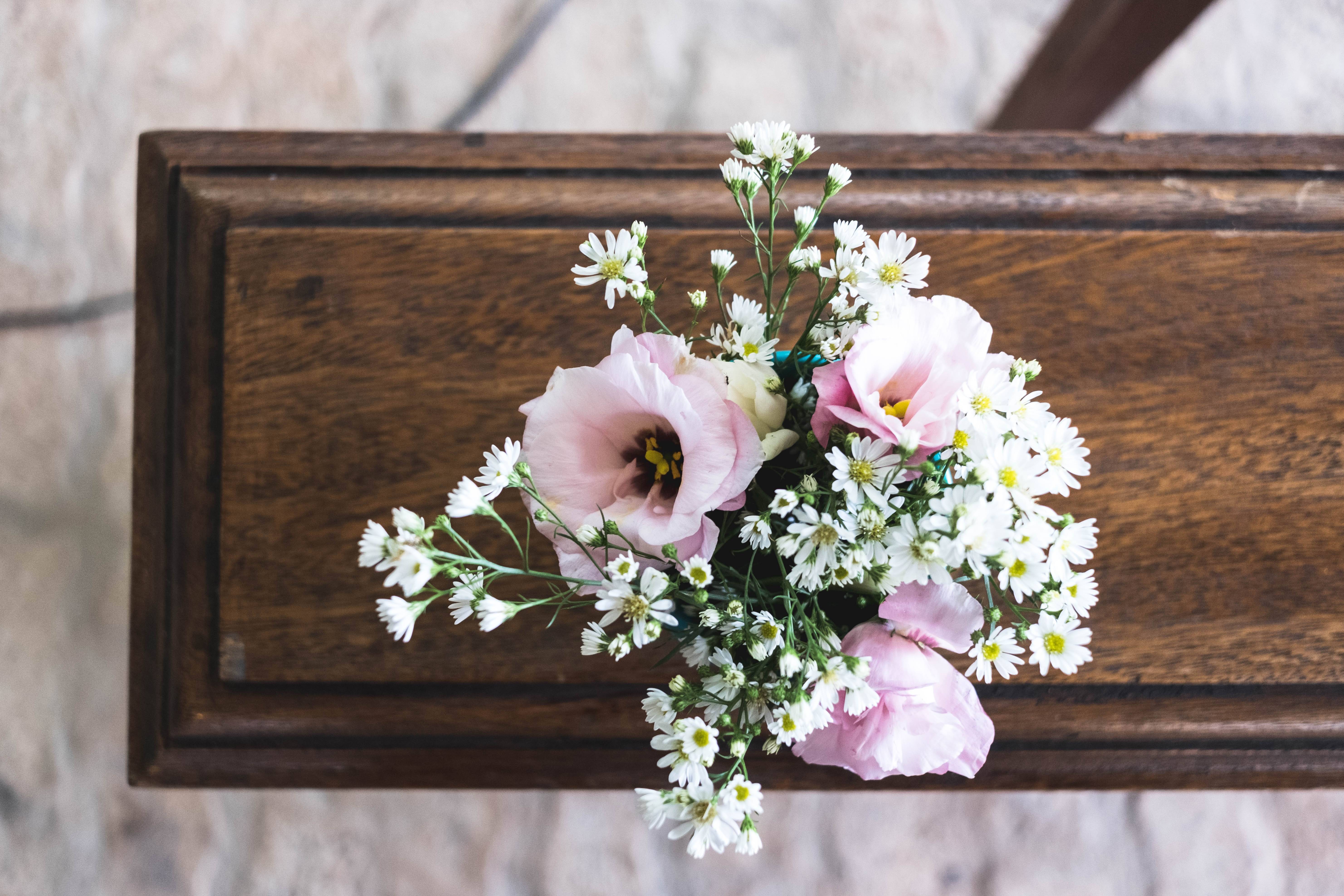 Coffin and funeral flowers