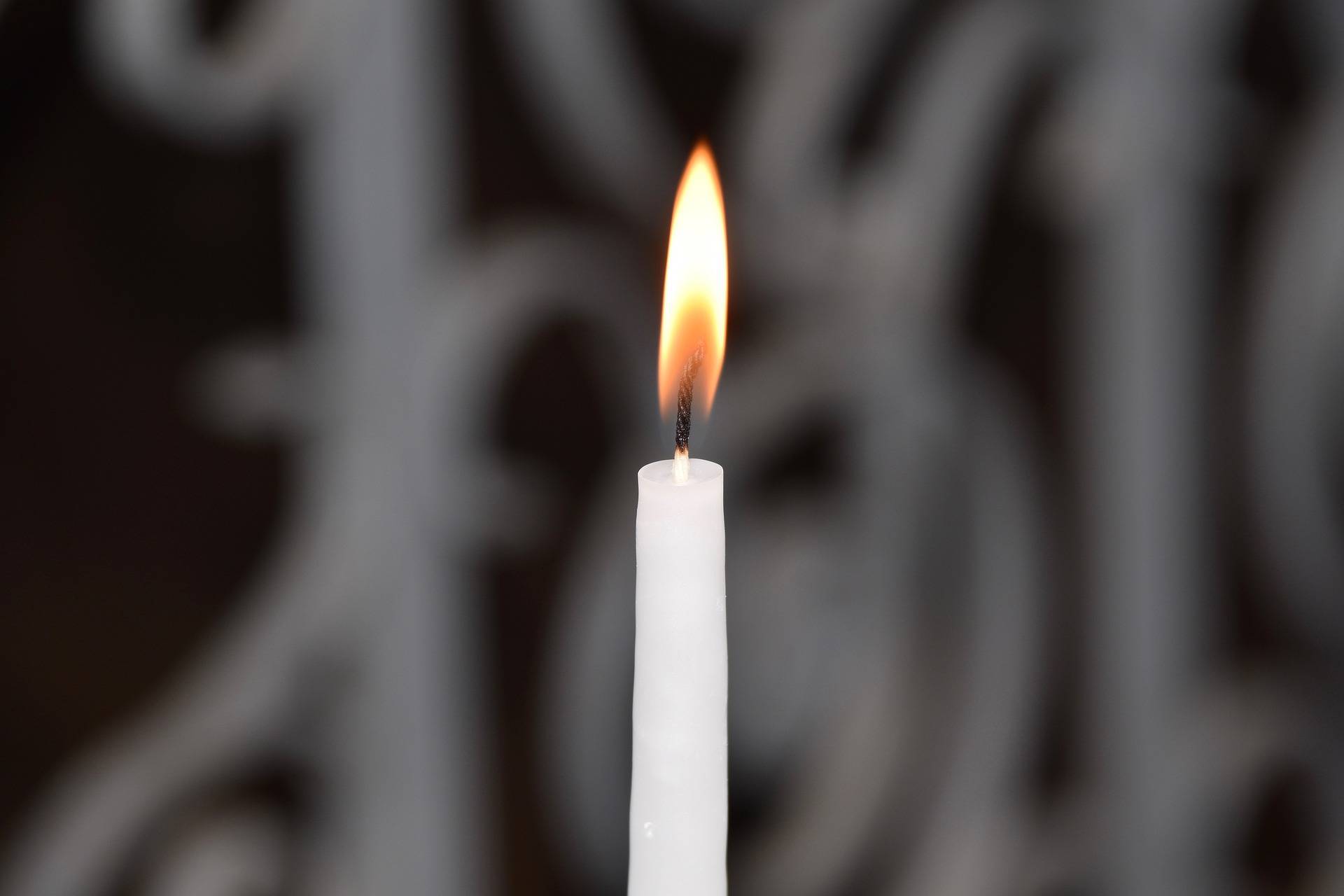 One lit candle