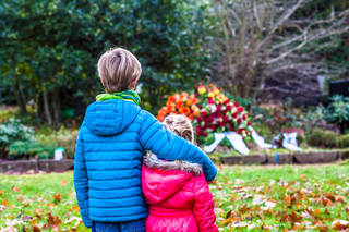 Boy and girl at a funeral