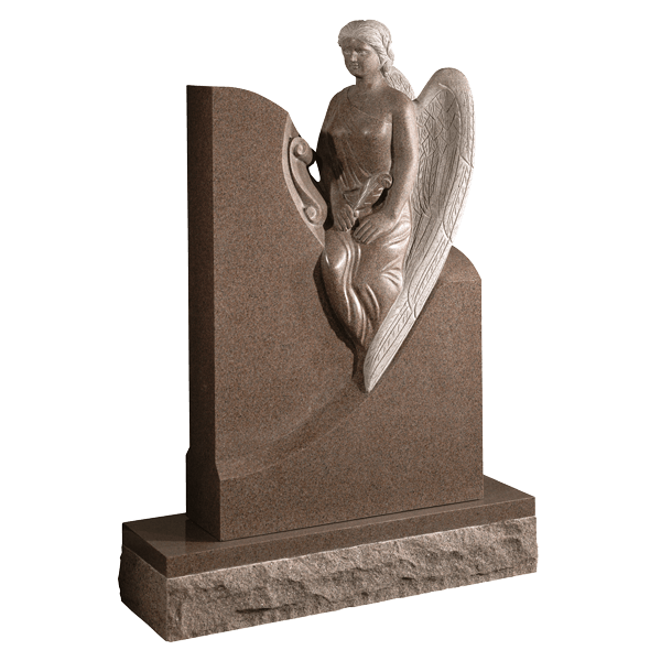 Carved Angel Sitting On Headstone